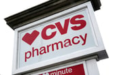 A CVS Pharmacy sign is shown in Mount Lebanon, Pa.