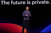 Mark Zuckerberg speaks on stage during an event.