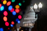 The U.S. Capitol is seen amid holiday lights at night.