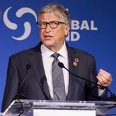 Bill Gates gestures during a speech at an event in New York.