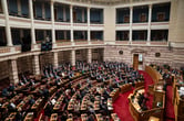 Greek Prime Minister Kyriakos Mitsotakis addresses the parliament.