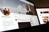The Twitter account for Guo Wengui is displayed on a computer monitor.
