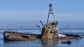 A rusting fishing trawler that ran aground.