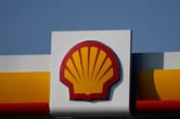A Shell logo on a gas station.