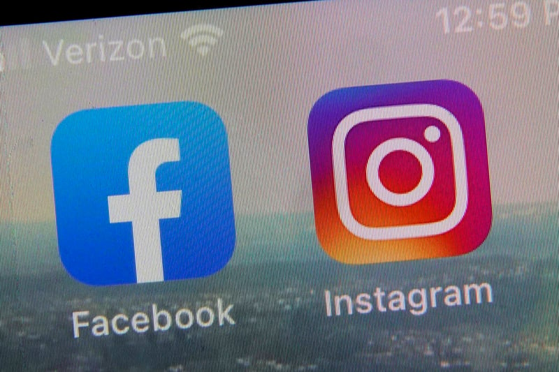 The Facebook and Instagram apps on the screen of a smartphone.