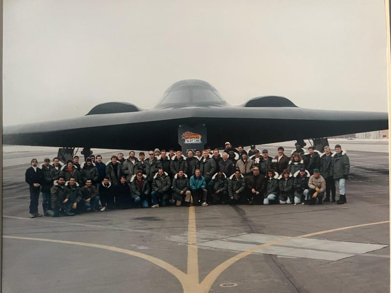 The cold weather testing crew pose with the B-2 Spirit Stealth Bomber.