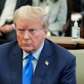 Photo shows a close-up of Donald Trump in a courtroom