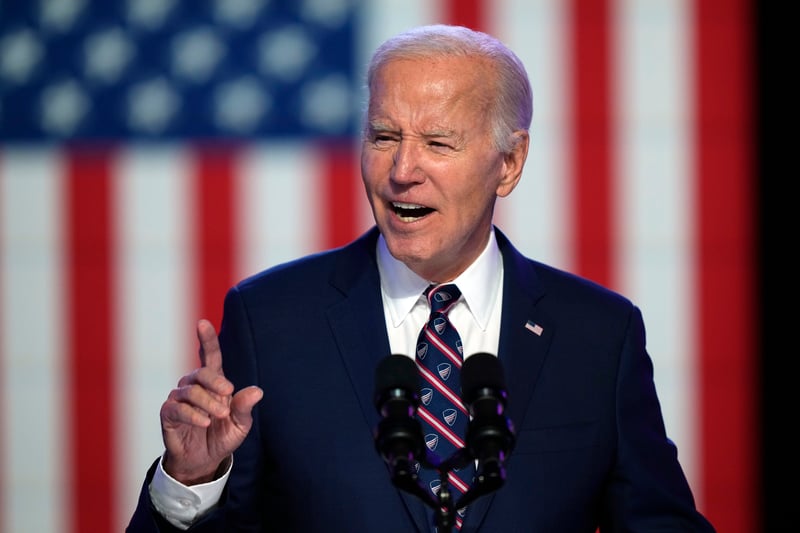 Joe Biden in front of flag
