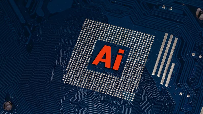 The initials "AI" on a computer chip.