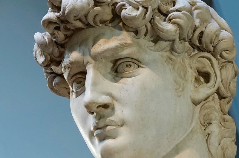 A close-up photo of Michelangelo's David statue.