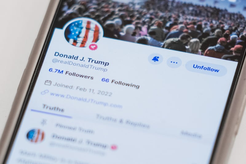 Donald Trump's Truth Social account on a smartphone.
