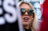 The Supreme Court building reflects off Isabella DeLuca's sunglasses.