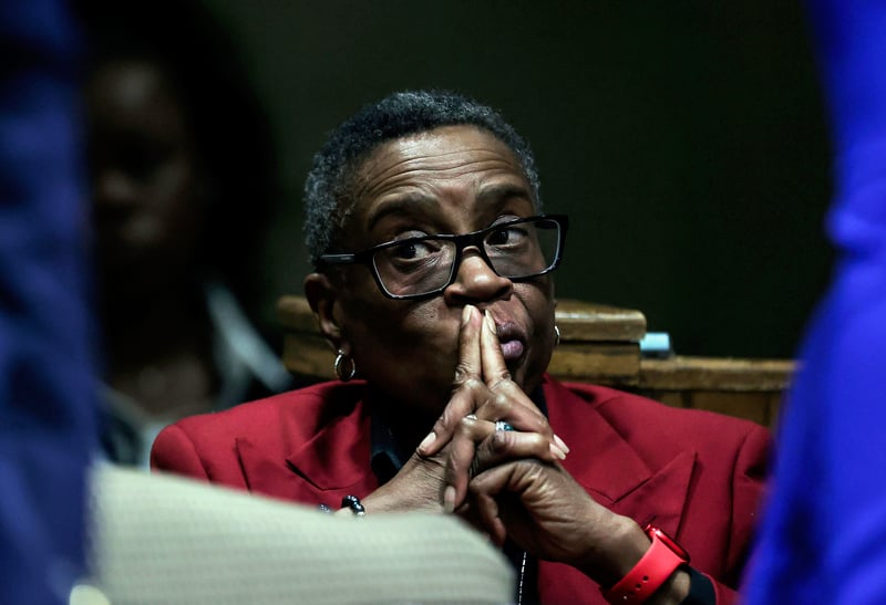 Melissa Boyd sits in a courtroom.