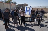 People gather during a protest at Israel's Nitzana border crossing.