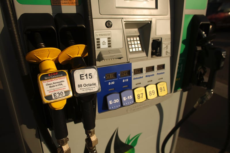An E15 nozzle at a pump at a gas station.