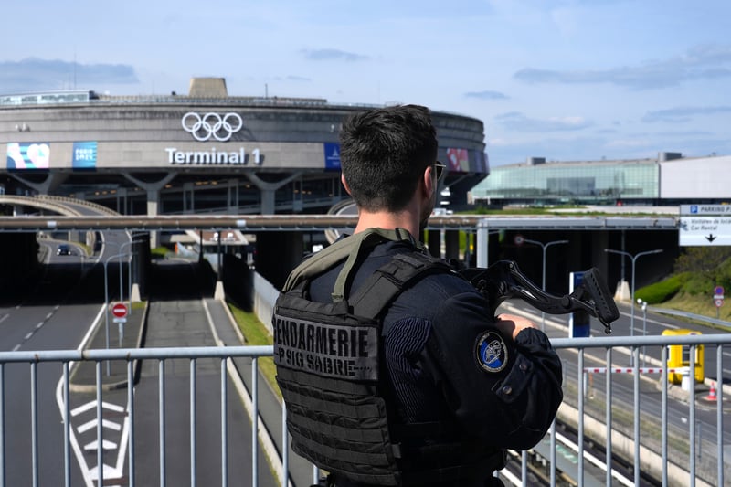 A gendarme patrols near the Charles de Gaulle Airport in Roissy-en-France.