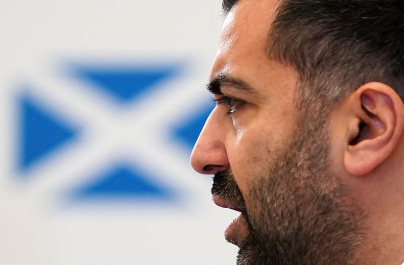 Huzma Yousaf and a Scottish flag.