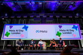 Five people participate in a panel discussion during a Meta AI Day event.