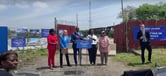 (Left to right) Philadelphia Mayor Cherelle Parker, U.S. Representative Mary Gay Scanlon, Environmental Protection Agency administrator Michael Regan, Philadelphia Industrial Development Corporation Jodie Harris and Bartram's Garden executive director Maitreyi Roy stand in front of a brownfield site in Kingsessing, Philadelphia, PA.