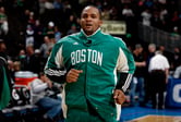Glen "Big Baby" Davis jogs onto the court wearing Boston Celtics warm-up gear before an NBA game.