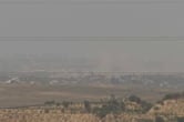 A screenshot taken from video showing a general view of northern Gaza as seen from southern Israel.
