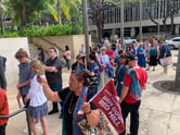 Red Hill jurors line up outside Honolulu Federal Courthouse