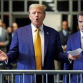 Donald Trump with his lawyer outside Manhattan court.