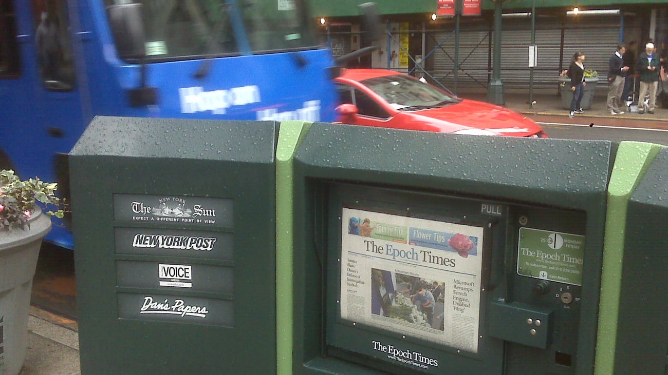 Former Epoch Times executive pleads guilty to multimillion-dollar fraud scheme that funded newspaper