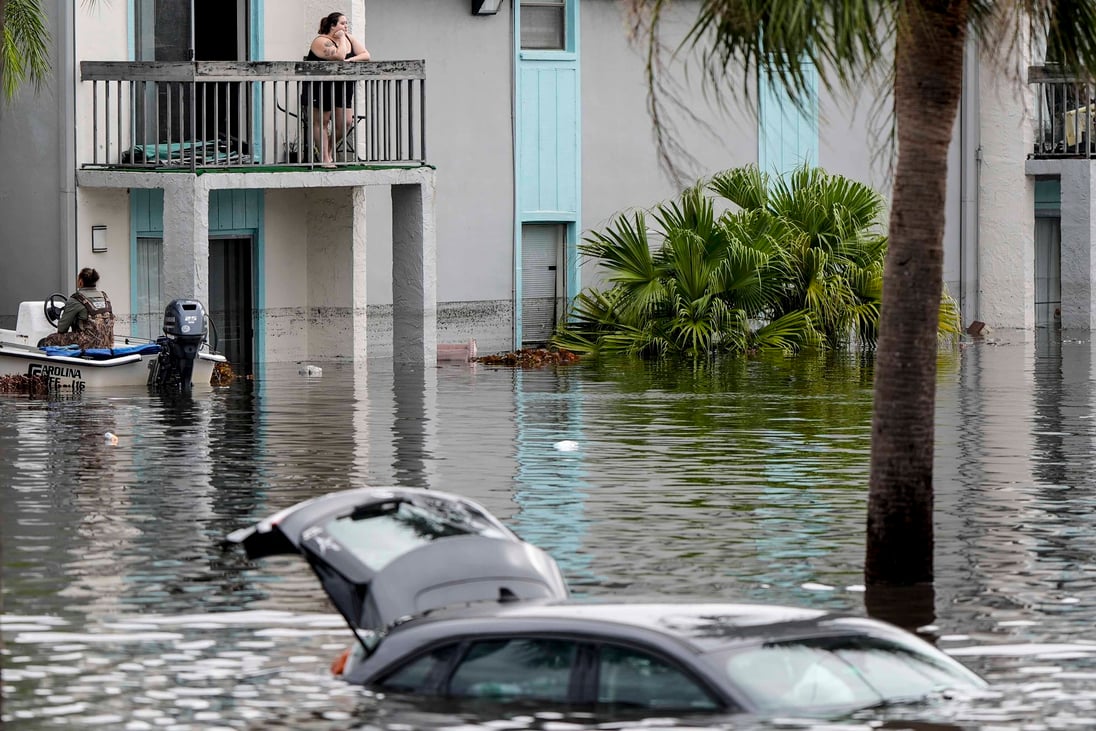 9 dead, millions at flooding risk and without power in wake of ...
