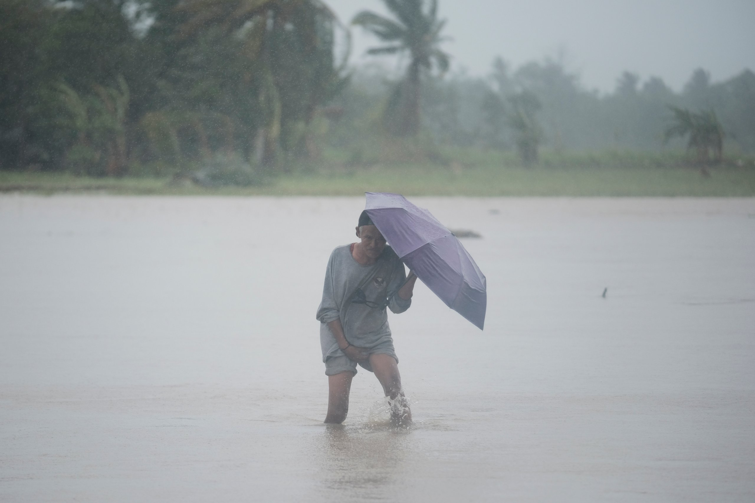Tropical storm battering Philippines leaves at least 24 people dead in ...