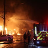 The Palisades fire at night.