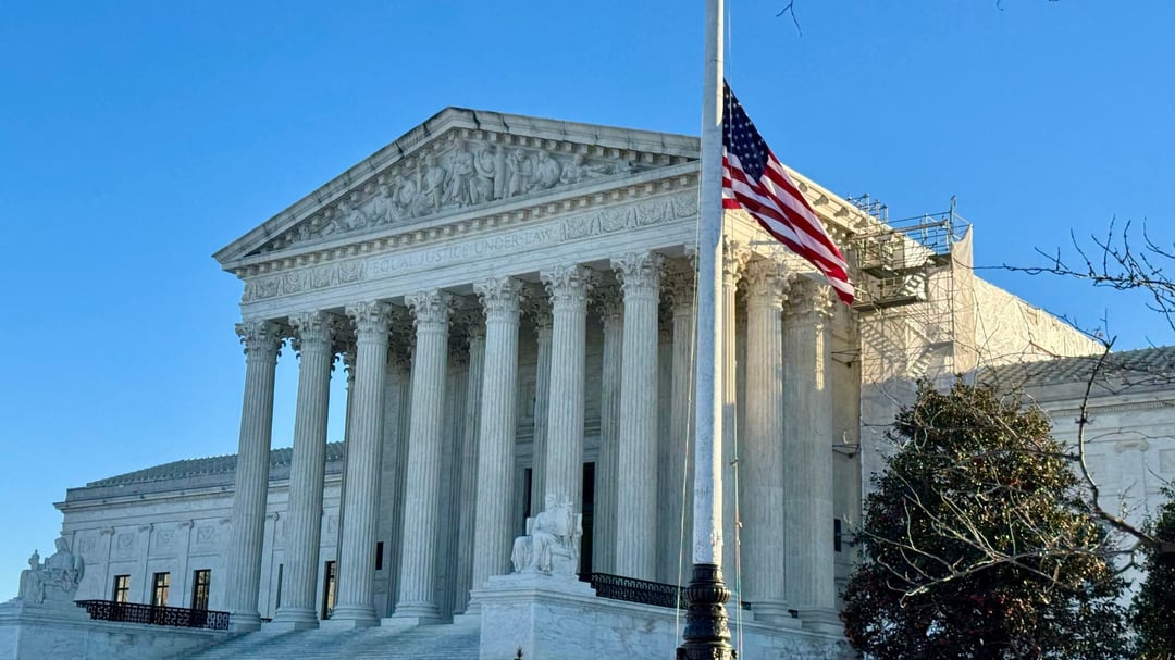 A flag flying at half-staff outside of the U.S. Supreme Court.
