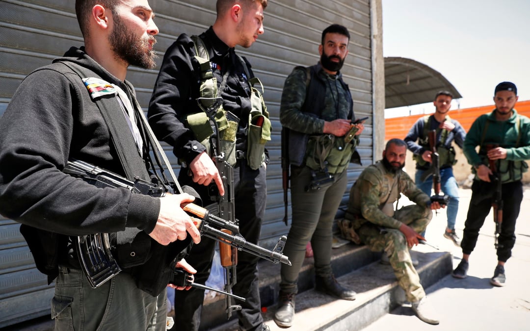 At least 10 dead in Syria after sectarian clashes in Druze suburb of Damascus
