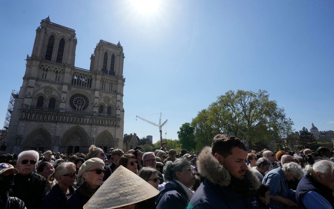 Worshippers return to restored Notre Dame for Easter rituals with emotion and awe