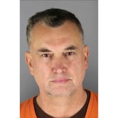 Vance Boelter wears an orange jumpsuit in this mugshot.