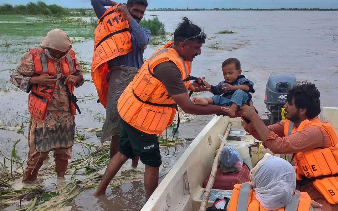 Mass evacuations in eastern Pakistan as India releases water from swollen rivers
