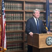 Nebraska Attorney General Mike Hilgers speaks to reporters