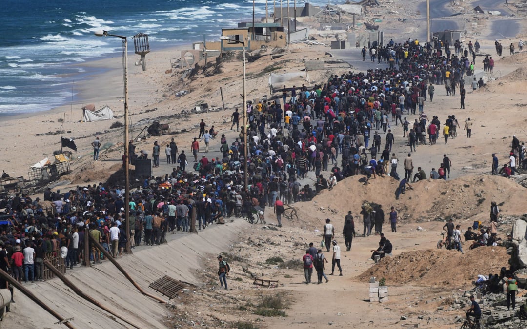 Israel ceases fire and Gazans start returning home
