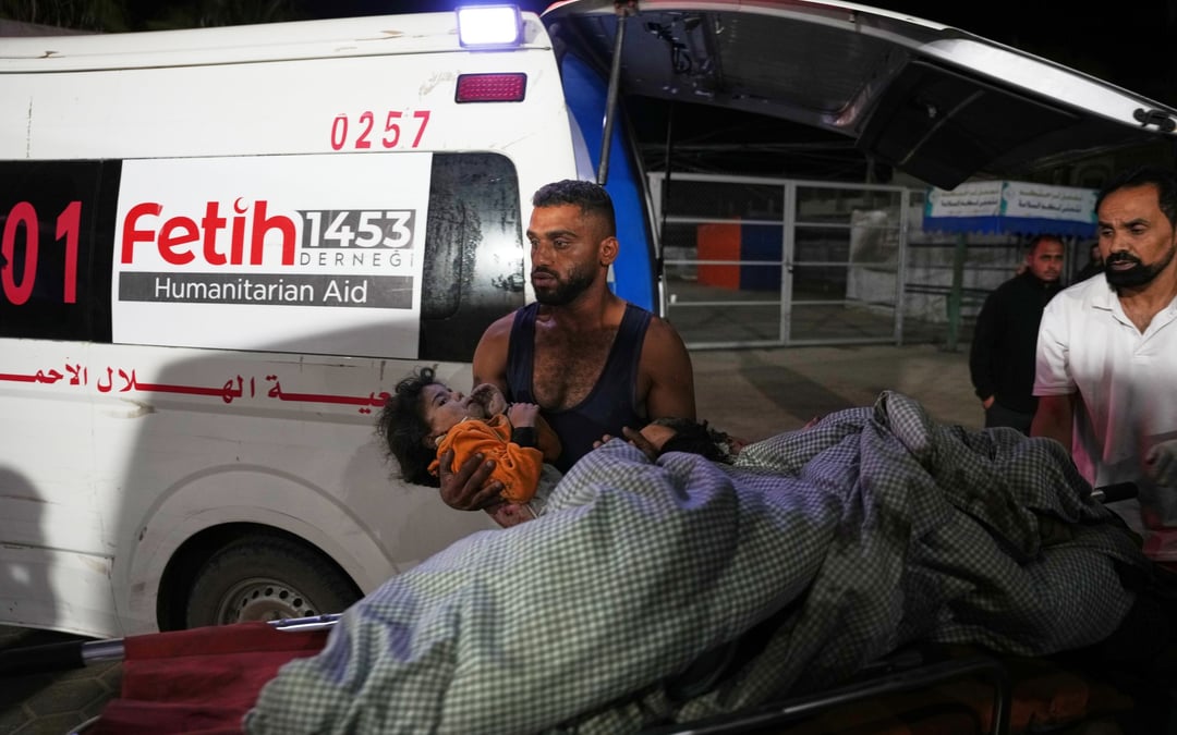 Israel’s military says ceasefire is back on as death toll from overnight strikes in Gaza reaches 104