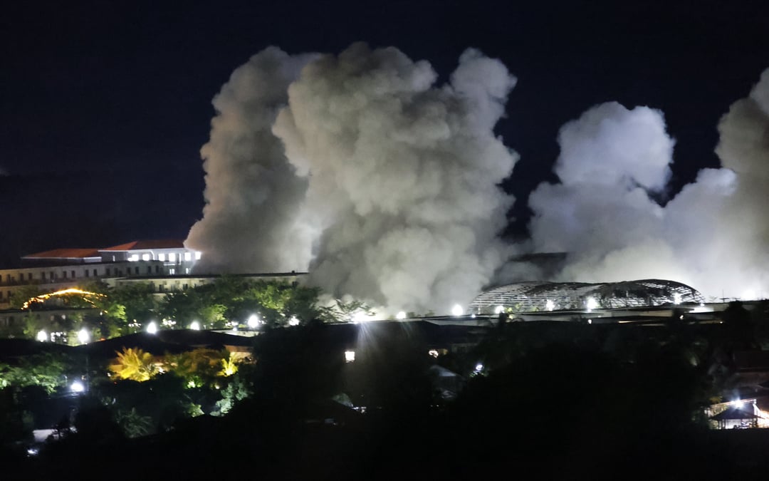 Stragglers from Myanmar scam center raided by army cross into Thailand as buildings are blown up