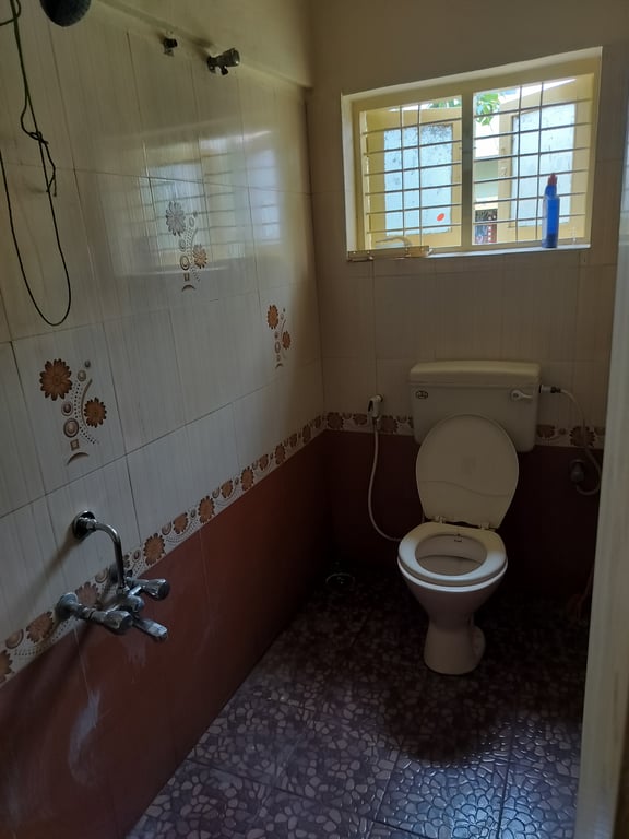 2BHK GF granite flooring with 2 attached bath 100% vastu compliant Secured 2 wheeler parking. thumbnail 9