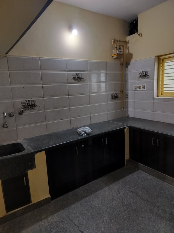 2BHK GF granite flooring with 2 attached bath 100% vastu compliant Secured 2 wheeler parking. thumbnail 5