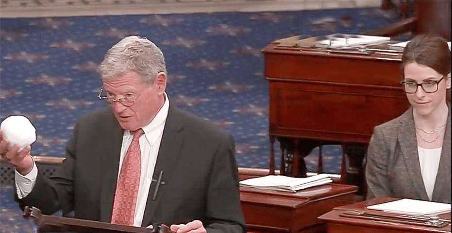 Mandy Gunasekara watches as her then-boss Sen. Jim Inhofe (R-Okla.) holds a snowball in the Senate chamber in 2015. 