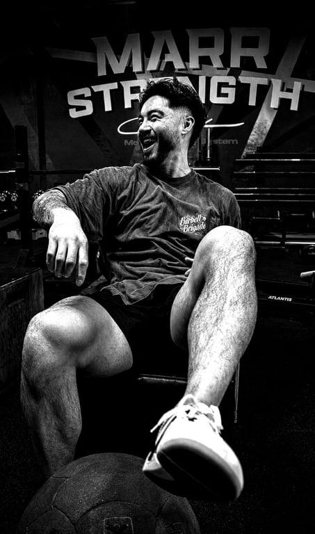 Athlete training the BoxMatrix method with a med ball
