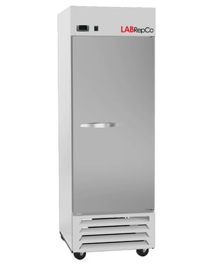 An upright Labrepco labeled 23 cu. ft. laboratory refrigerator with a stainless steel exterior, closed solid door, horizontal pull door handle and control panel at the top