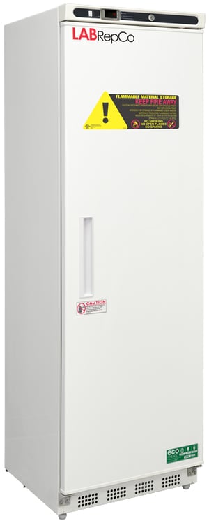 An upright, 14 cubic foot laboratory refrigerator for flammable material storage with a labrepco label and warning sticker
