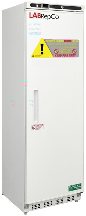 An upright right, 14 cubic foot laboratory refrigerator for flammable material storage, with solid door that has a recessed handle and a labrepco label and warning sticker