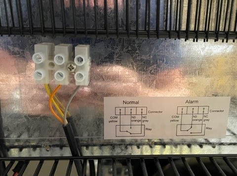 image of what remote alarm contacts look like in a refrigerator or freezer