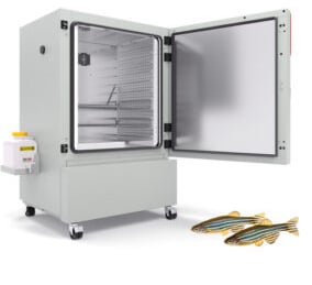 BINDER brand stability chamber used for zebrafish breeding with two zebrafish shown at bottom right of picture
