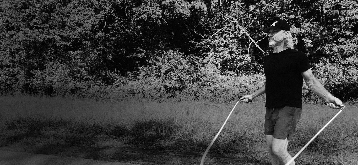 Todd training with Crossrope weighted jump ropes outdoors.